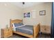 Comfortable bedroom featuring a cozy bed and ample natural light, creating a relaxing and inviting space at 11048 E Quintana Ave, Mesa, AZ 85212