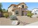 Attractive two-story home with low maintenance desert landscaping at 11048 E Quintana Ave, Mesa, AZ 85212