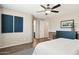 Bright main bedroom with an ensuite bathroom, offering privacy and convenience, perfect for relaxation at 11048 E Quintana Ave, Mesa, AZ 85212