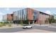 Modern multi-story office building with large windows, attractive architecture, and convenient parking at 11048 E Quintana Ave, Mesa, AZ 85212