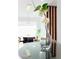 Dining room featuring table with glass top and decorative floral vase at 11601 N 64Th Pl, Scottsdale, AZ 85254