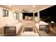 Cozy outdoor patio with comfortable seating, a built-in grill, and a bar, perfect for entertaining guests at 11601 N 64Th Pl, Scottsdale, AZ 85254