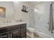 Well-lit bathroom with a single vanity, framed mirror and walk-in shower provides a modern and bright aesthetic at 1217 S Longmore Ct, Chandler, AZ 85286