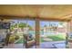 Inviting covered patio featuring a well-maintained pool and ample seating area for relaxation at 1217 S Longmore Ct, Chandler, AZ 85286