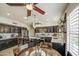 Open kitchen with a breakfast nook featuring dark wood cabinets and stainless steel appliances at 1217 S Longmore Ct, Chandler, AZ 85286