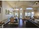 Open-concept living room with high ceilings and a connected dining space at 1217 S Longmore Ct, Chandler, AZ 85286