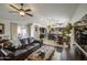 Spacious living room showcasing hardwood floors, an open floor plan, and abundant natural light at 1217 S Longmore Ct, Chandler, AZ 85286