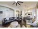 Spacious living room with vaulted ceilings, a ceiling fan, and an adjoining dining area at 1217 S Longmore Ct, Chandler, AZ 85286