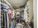 Walk-in closet with organized shelving, hanging rods, and lots of storage space at 1217 S Longmore Ct, Chandler, AZ 85286