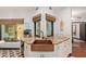 Close up of kitchen sink area with copper basin, granite counters and two windows at 1235 N Sunnyvale -- # 113, Mesa, AZ 85205