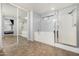 Bathroom area with a soaking tub and glass enclosed shower at 14129 W St Moritz Ln, Surprise, AZ 85379
