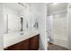 Bright bathroom with single sink vanity and a shower/tub combination at 14129 W St Moritz Ln, Surprise, AZ 85379