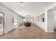 A bright, large dining room features tile floors and a modern ceiling fan at 14129 W St Moritz Ln, Surprise, AZ 85379