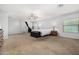 Large main bedroom boasts carpet flooring, ceiling fan, and ample space at 14129 W St Moritz Ln, Surprise, AZ 85379