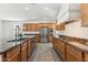 Contemporary kitchen featuring stainless steel appliances, granite countertops and gas range at 14364 W Cameron Dr, Surprise, AZ 85379