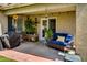 Relaxing covered patio with comfortable seating and a spot for outdoor grilling at 17765 W Ventura St, Surprise, AZ 85388