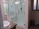 Modern bathroom with a walk-in shower, granite countertops, and tiled walls at 1819 E Sheena Dr, Phoenix, AZ 85022
