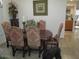 Formal dining area features stylish chairs, elegant decor and plenty of natural light at 1819 E Sheena Dr, Phoenix, AZ 85022