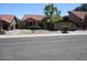 Charming single-story home with desert landscaping and a red tile roof at 1819 E Sheena Dr, Phoenix, AZ 85022