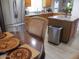 Stylish kitchen with granite countertops, stainless steel appliances, and a breakfast nook at 1819 E Sheena Dr, Phoenix, AZ 85022