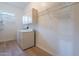 Laundry room with shelving and washer/dryer at 19608 N Regents Park Dr, Surprise, AZ 85387