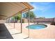 Spacious backyard featuring pool, brick patio, and storage shed at 20609 N 4Th Ave, Phoenix, AZ 85027