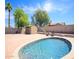 Large backyard features pool with lounge chairs, storage shed, and mature trees at 20609 N 4Th Ave, Phoenix, AZ 85027