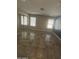 Spacious bedroom features tile flooring, ample natural light from the windows, and closet at 20609 N 4Th Ave, Phoenix, AZ 85027