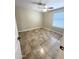 Bedroom featuring tile flooring, window, and ceiling fan at 20609 N 4Th Ave, Phoenix, AZ 85027