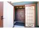 Inviting entryway featuring double doors with decorative glass panels, offering a warm welcome at 20609 N 4Th Ave, Phoenix, AZ 85027