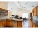 Bright kitchen with granite countertops, stainless steel appliances, and a spacious island, perfect for gatherings at 20609 N 4Th Ave, Phoenix, AZ 85027
