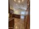 Well-lit kitchen featuring granite counters and wood cabinets, and eat in dining area at 20609 N 4Th Ave, Phoenix, AZ 85027