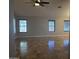 Bright living room featuring tile flooring, ceiling fan, and neutral wall colors at 20609 N 4Th Ave, Phoenix, AZ 85027