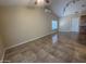 Living room with tile floor and white door, perfect for relaxing at 20609 N 4Th Ave, Phoenix, AZ 85027