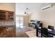 Spacious living area with tile floors, ceiling fan, and sliding glass doors to backyard at 20609 N 4Th Ave, Phoenix, AZ 85027