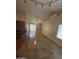 Cozy living room open to the kitchen, featuring tile flooring and a ceiling fan at 20609 N 4Th Ave, Phoenix, AZ 85027