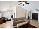 Cozy living room with high ceilings, neutral color palettes, and comfortable seating arrangement at 20609 N 4Th Ave, Phoenix, AZ 85027