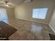 Open living room with vaulted ceilings, neutral paint, tile floors and natural light at 20609 N 4Th Ave, Phoenix, AZ 85027