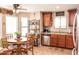 Bright kitchen area with stainless appliances, updated cabinets, and natural light at 2101 S Meridian Rd # 176, Apache Junction, AZ 85120