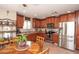 Well-appointed kitchen with stainless steel appliances and a view to dining area at 2101 S Meridian Rd # 176, Apache Junction, AZ 85120