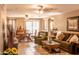 Spacious living room with modern furnishings and a seamless transition to the dining area at 2101 S Meridian Rd # 176, Apache Junction, AZ 85120