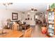 Open-concept living and dining area featuring tile floors and neutral décor at 2101 S Meridian Rd # 176, Apache Junction, AZ 85120