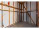 Unfinished basement area with exposed framing, utility lines, and potential for storage at 2145 W Cholla St, Phoenix, AZ 85029