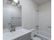 Clean bathroom with a modern vanity, updated faucet, and combined tub and shower at 2440 N 22Nd Ave, Phoenix, AZ 85009