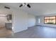 Bright and airy living room featuring light-colored floors, a modern ceiling fan, and a welcoming entrance at 2440 N 22Nd Ave, Phoenix, AZ 85009