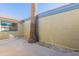 Private patio area featuring a large palm tree and sunny exposure at 2440 N 22Nd Ave, Phoenix, AZ 85009