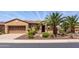 Charming home with desert landscaping, a gated courtyard, and meticulously maintained curb appeal at 27380 N 128Th Ln, Peoria, AZ 85383