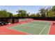 Exterior view of two tennis courts surrounded by fencing at 27380 N 128Th Ln, Peoria, AZ 85383