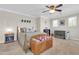 Comfortable bedroom featuring a ceiling fan, and neutral decor with plenty of natural light at 3029 E Patrick St, Gilbert, AZ 85295