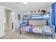 ' bedroom with a bunk bed, fun decor, and easy access to the bathroom at 3029 E Patrick St, Gilbert, AZ 85295
